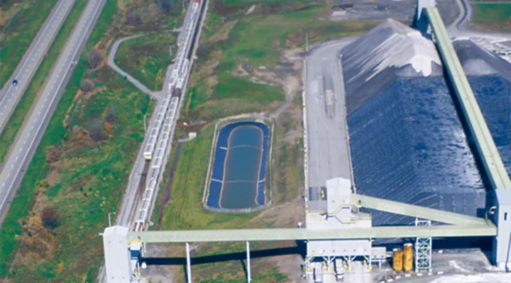 Aerial view of a railroad track and industrial site