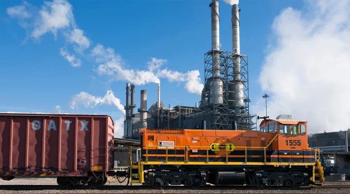 Train pulling freight railcars